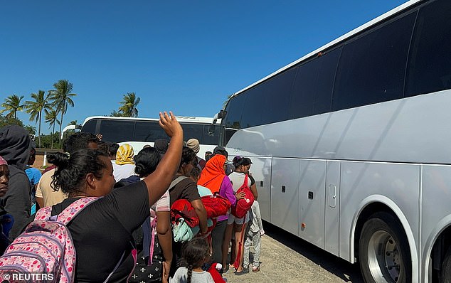 Migrants participating in U.S.-bound caravans took buses to several towns in Tehuantepec, Mexico, on Nov. 24. Mexican President Sheinbaum said Mexico is already taking steps to stop the US-bound caravans before they reach the border.