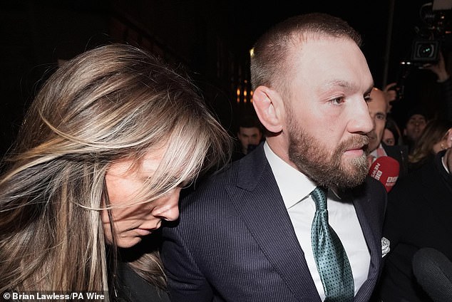 McGregor and his partner, Dee Devlin, outside the High Court in Dublin after Friday's ruling