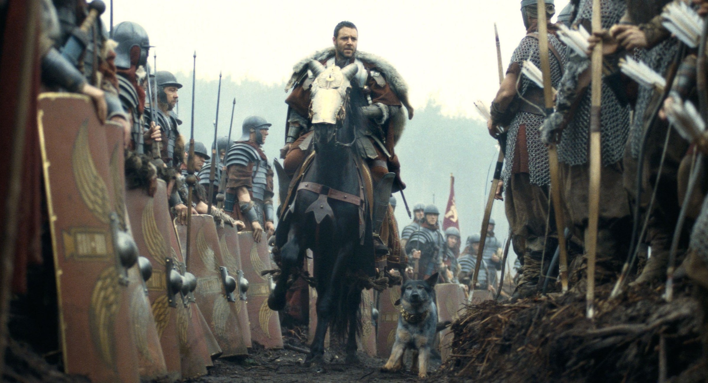 Gladiator Maximus (Russell Crowe) rides on horseback through an army of Roman soldiers in 2000's Gladiator