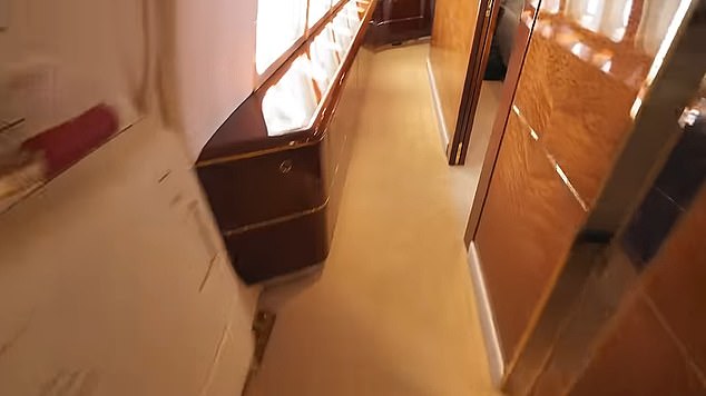 The first tour shows a long, wood-lined hallway with gold carpet and an exit door