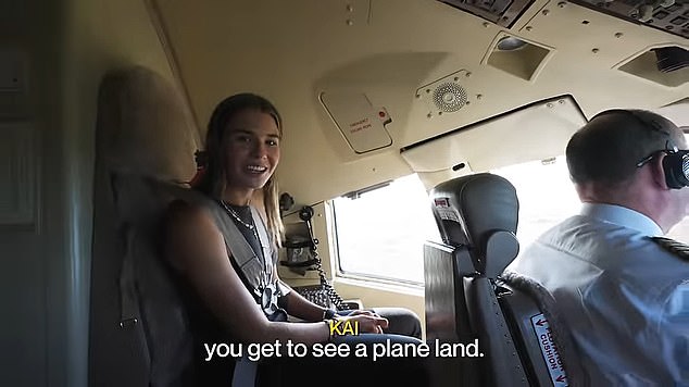 Kai also straps himself into the cockpit to watch the pilots land Trump Force One in Texas