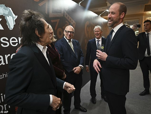 William appeared in good spirits as he shared a joke with Ronnie Wood, who he also met at last year's awards ceremonies