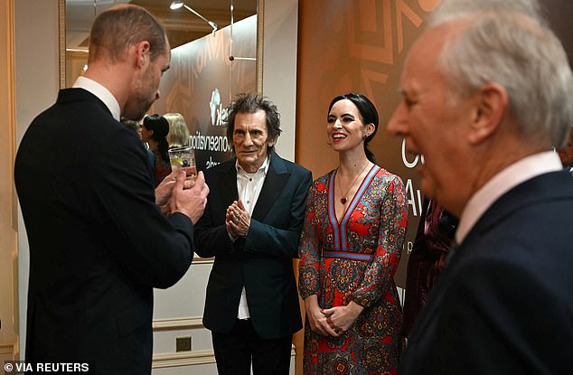 His Royal Highness was joined ahead of the ceremony by A-listers including Mark Knopfler and Ronnie and Sally Wood, with whom he was seen having an animated conversation