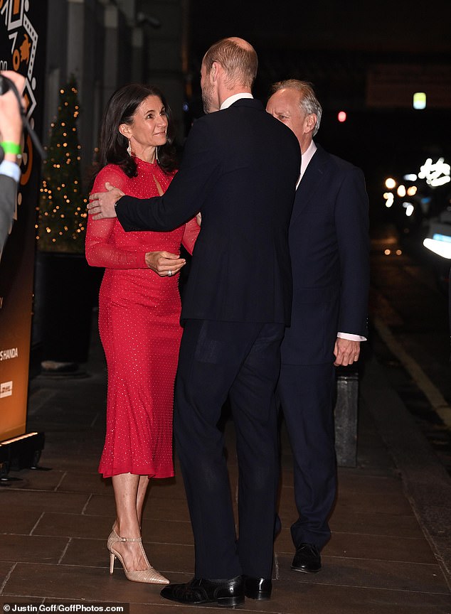 The Prince of Wales, 42, looked dapper in a navy blue suit as he arrived at the Savoy Hotel for the event, beaming as he greeted guests