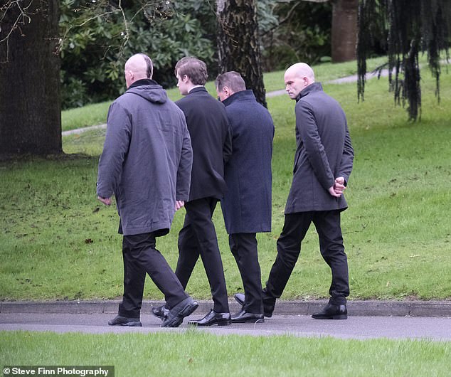 Members of Georgina Cooper's family, including her brother Paul Donnelly (right)