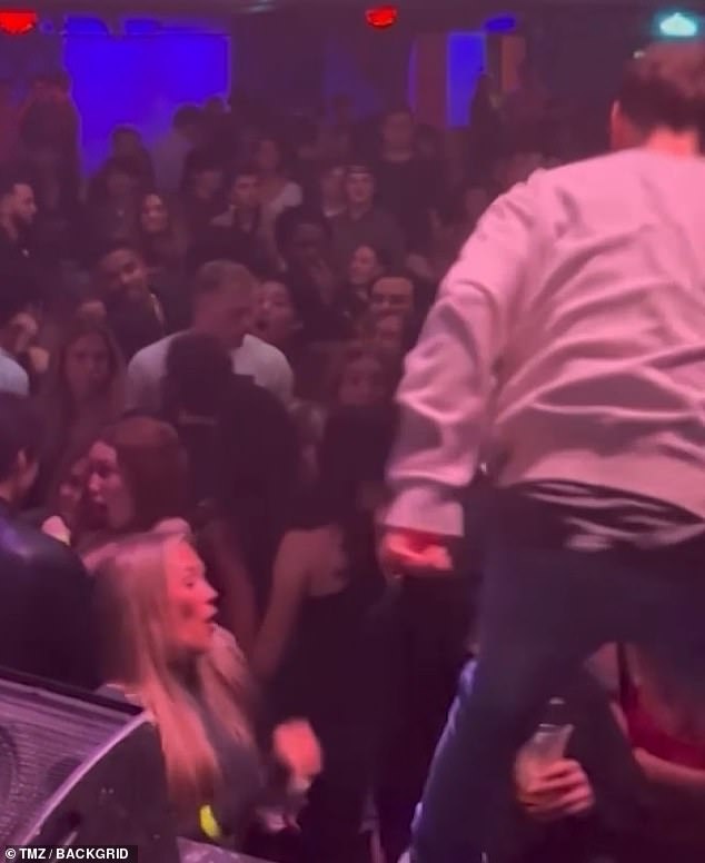 Other audience members seemed shocked by Lil Xan's actions, as they can be seen smiling and laughing at him just seconds before he reaches down to apparently punch the man.