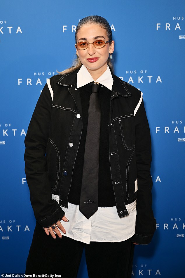 DJ Harriet Rose showed off her unique fashion sense in a white shirt layered under a gray sweater and a black denim jacket