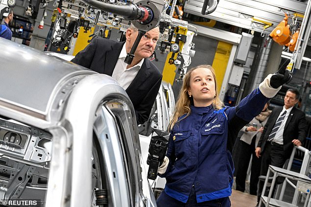 In trouble: German Social Democratic Chancellor Olaf Scholz visits the BMW Group factory in Munich