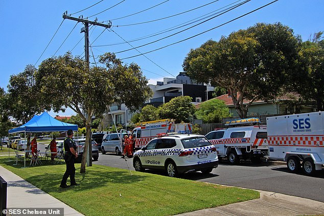 The man and woman were discovered at a property on James Sreet in Mordialloc in Melbourne's south-east (police and SES teams are pictured at the scene)