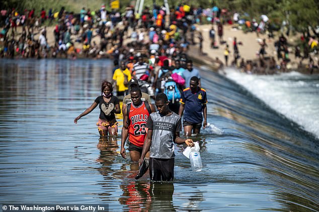 Migrants cross back and forth between the United States and Mexico on the Rio Grande in Ciudad Acuna, Mexico on Thursday, September 16, 2021