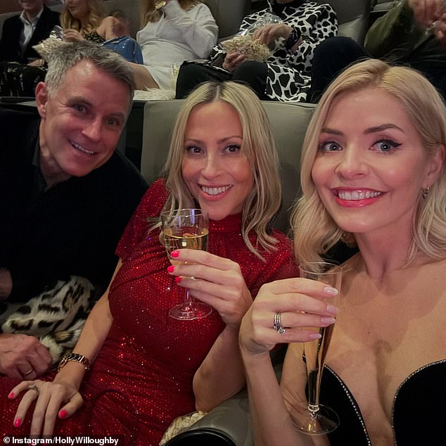 Holly sat next to Nicole and her husband Stephen Haines