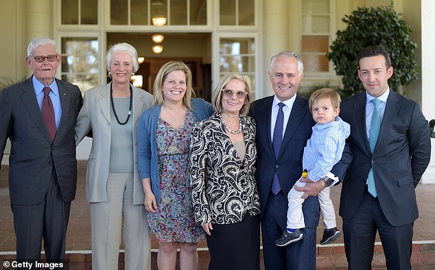 Tom Hughes' daughter Lucy Turnbull, wife of former Prime Minister Malcolm Turnbull, said goodbye to her father on Thursday. Pictured Lucy and Malcolm Turnbull with their family and Mr and Mrs Hughes outside Government House in 2015