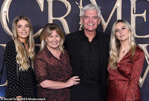 Phillip's other daughter Molly, 30, was also in attendance, with Ruby writing on her Instagram Story: 'Best day ever' (the family pictured in 2018)