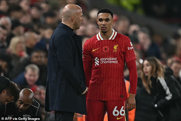 Arne Slot (left) pictured talking to Alexander-Arnold during a recent win over Aston Villa