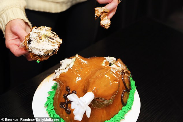 The entire cake serves 12 to 16 people and contains more than 4,800 calories, according to DailyMail.com estimates