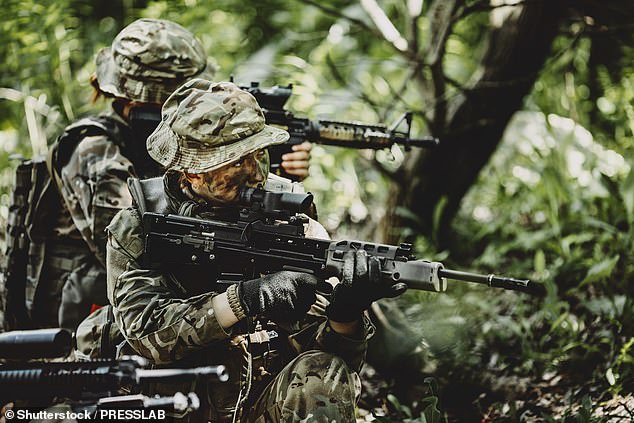 Robert Jenrick, the shadow Secretary of State for Justice, said SAS soldiers were being forced to kill terrorists rather than capture them because the 'European Court will set them free (file image of special forces soldiers during military maneuvers)