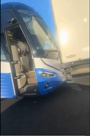 The bus appeared to have collided with a truck on the highway