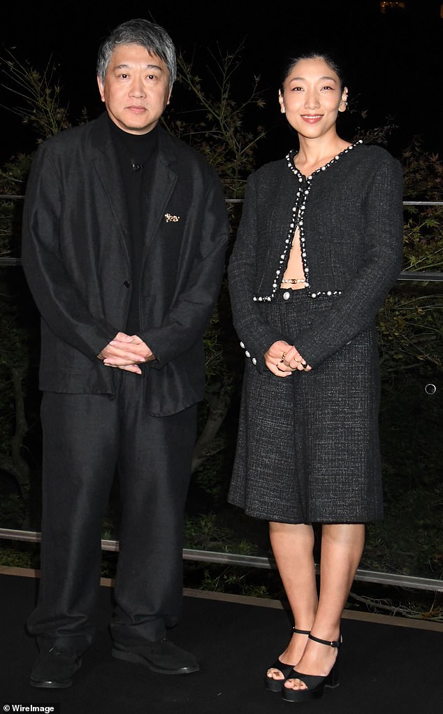 Director Hirokazu Kore-eda looked dapper alongside Sakura And, who wore a black tweed ensemble