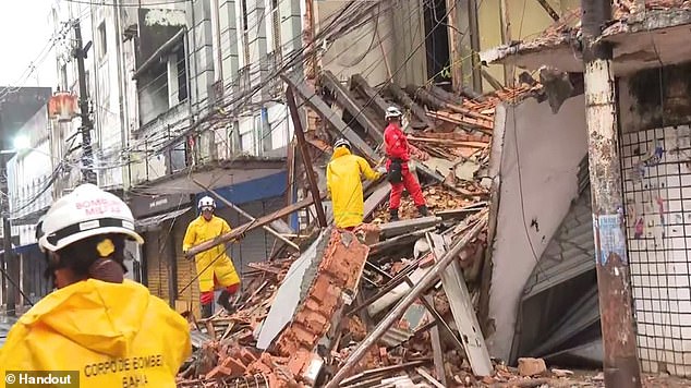 Brazilian aid workers resumed the search Thursday for Paulo Andrade, who was about to leave his home from work when it collapsed in a landslide. Andrade's mother and younger brother were rescued