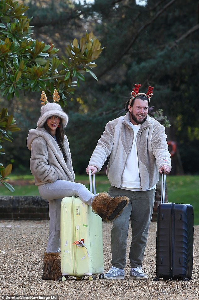 James, 31, wore a casual look with gray jeans and a white and gray fleece, while his girlfriend Jodie opted for an all-gray ensemble, accessorized with brown furry boots