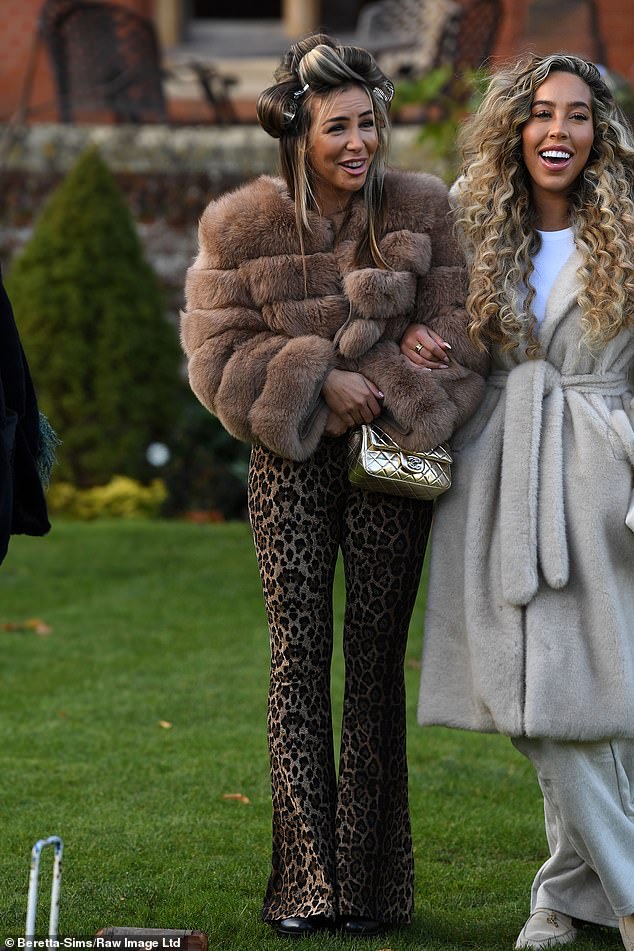 Elma posed next to Dani, 26, as the pair appeared in good spirits