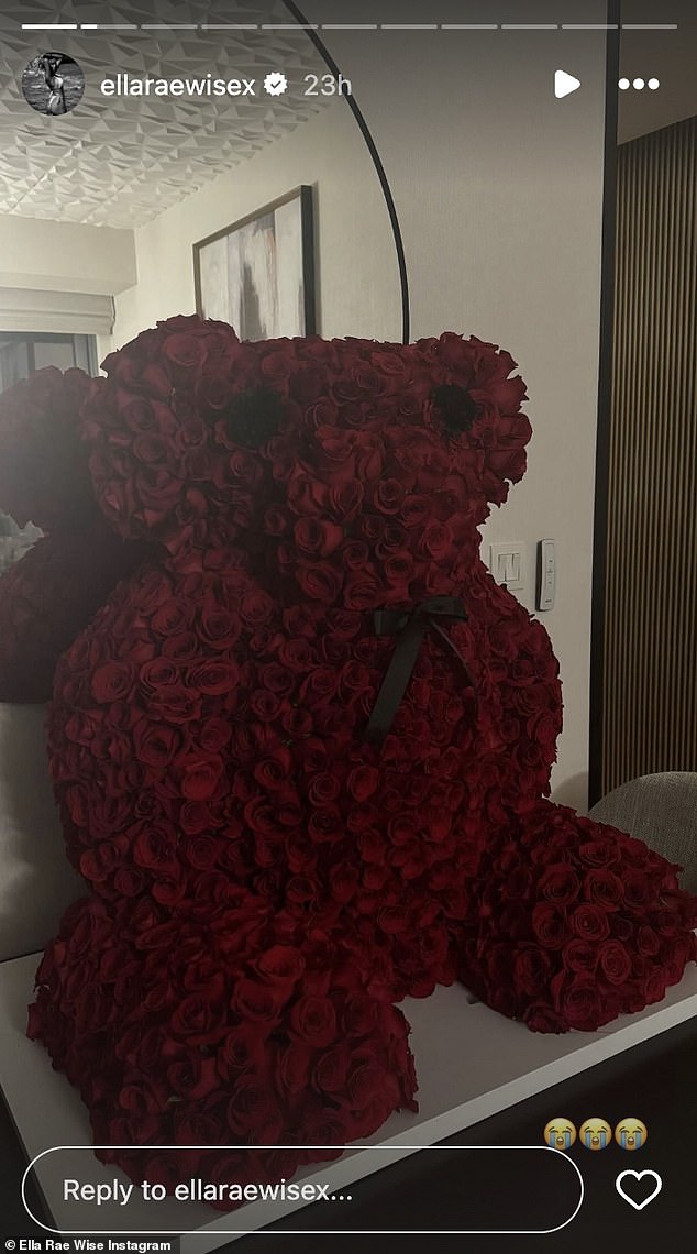 While Ella has been keeping her new romance under wraps, she has dropped hints by sharing a photo of a teddy bear made from 1,500 red roses from someone special.