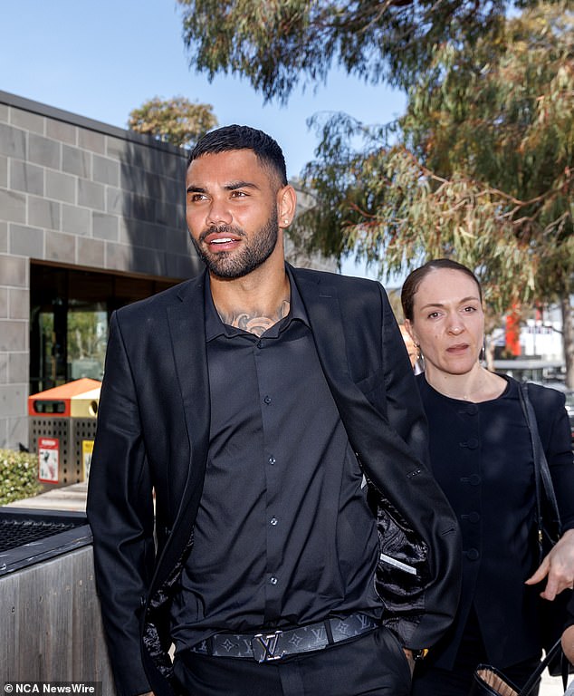 Tarryn Thomas leaves Broadmeadows District Court where he pleaded guilty to making a series of alleged harassing phone calls to his former partner