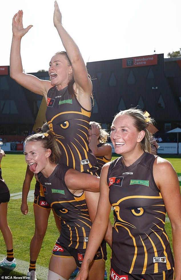 Hawthorn's Round 10 AFLW victory earned the Hawks men's and women's players significant cash bonuses as they claimed the $1 million McClelland Trophy prize - even though Brisbane could win both premierships. Photo: Michael Willson/Getty Images