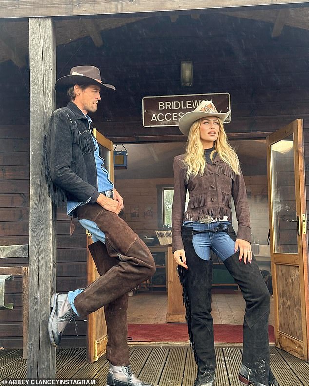 Abbey Clancy and her husband Peter Crouch turned heads when they posed up a storm in Wild West costumes on Instagram on Tuesday