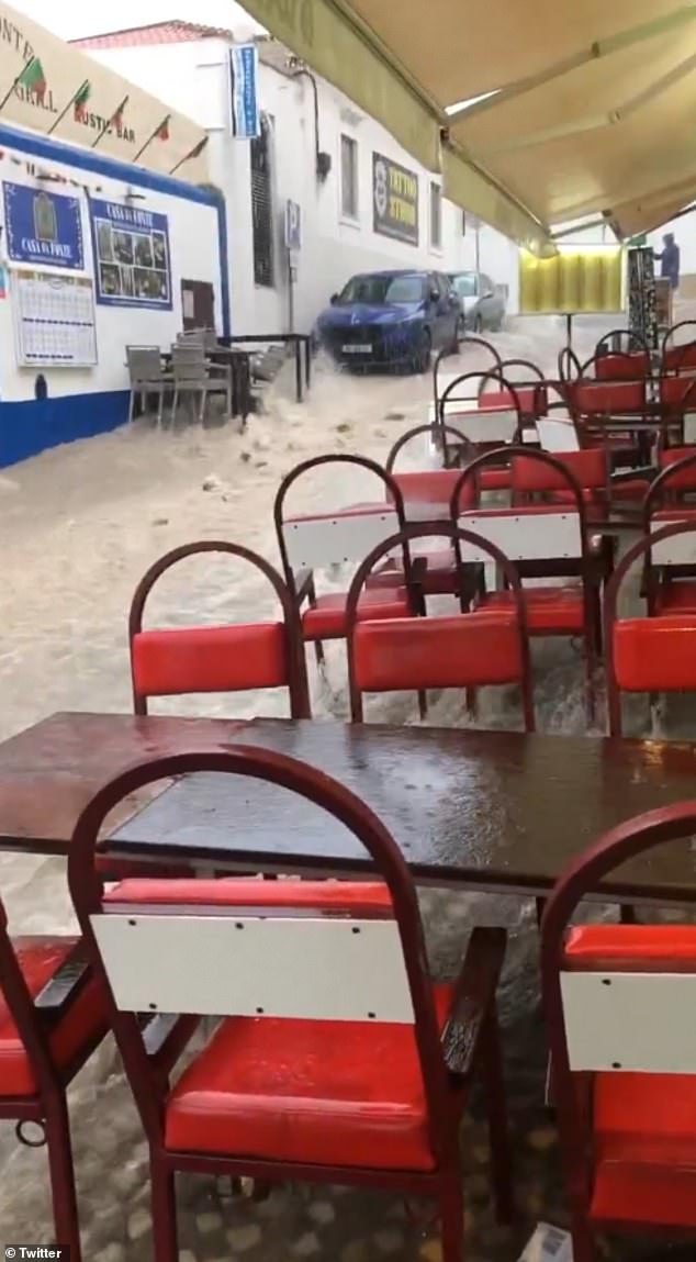 Terrifying videos shared on social media show water rushing through central Albufeira as homes and businesses are submerged