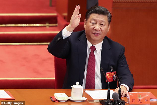 An American has been arrested in Germany for espionage after being accused of conspiring with China. The photo shows Chinese President Xi Jinping