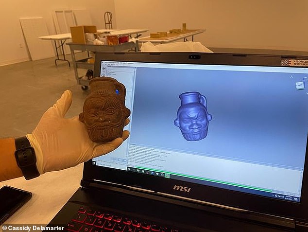 Davide Tanasi, a researcher at the University of South Florida, creates a 3D replica of the Egyptian Bes mug used in the study