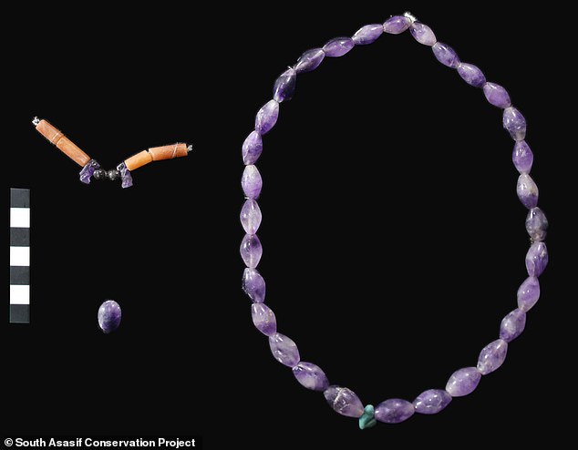 The artifacts include a bead necklace made of amethyst that was discovered while the archaeologists were carrying out restoration work on the tomb of Karabaskin, a 25th Dynasty official.