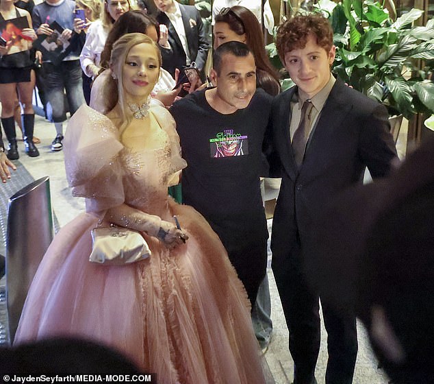 Ariana Grande has gone 'Instagram official' with her new boyfriend and co-star Ethan Slater. The American pop star, 31, and Broadway actor, 32, attended the Wicked premiere in Sydney on Sunday and shared their first photo together on social media on Monday. Both shown with a fan