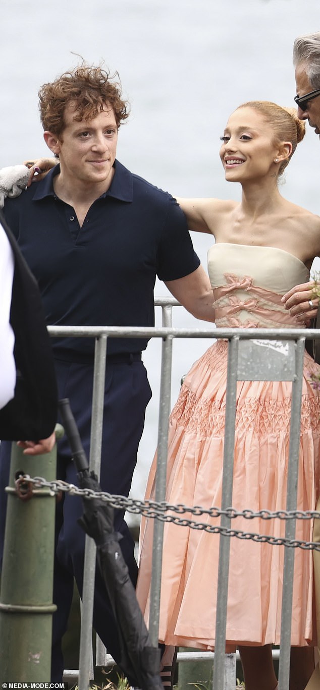 Ariana Grande and her boyfriend, actor Ethan Slater, put on a sweet show in Sydney on Tuesday as they attended a photocall to promote their new movie Wicked. Both shown