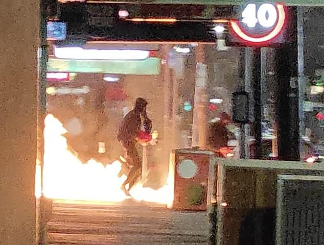 A trio of arsonists, dressed all in black, were caught just before 2 a.m. on Thursday by bystanders who stormed into Melbourne's LUX Nightclub with jerry cans.