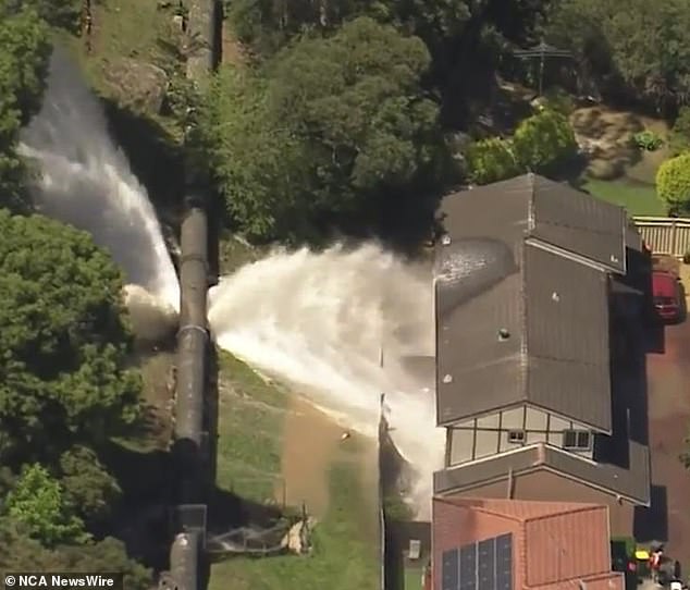 The large flow exploded in nearby houses at Binya Place and Inelgah Road, quickly flooding them (water shown flooding a house near the pipeline)