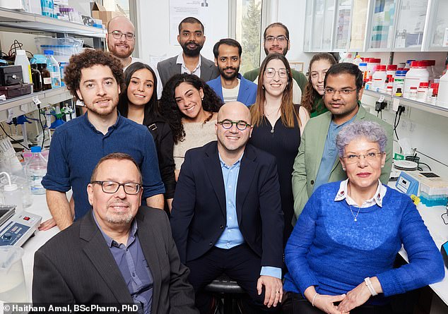 Dr. Amal (center) and his team of researchers in their laboratory in Jerusalem. The team focuses on nitric oxide and its role in the brain