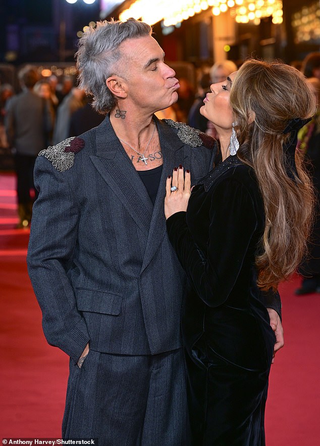 Ayda Field was on hand to help her husband Robbie Williams overcome his personal grief as they frolicked on the red carpet at the Better Man premiere in London