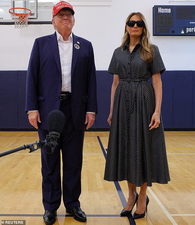 Barron Trump is pictured voting for his father in snap