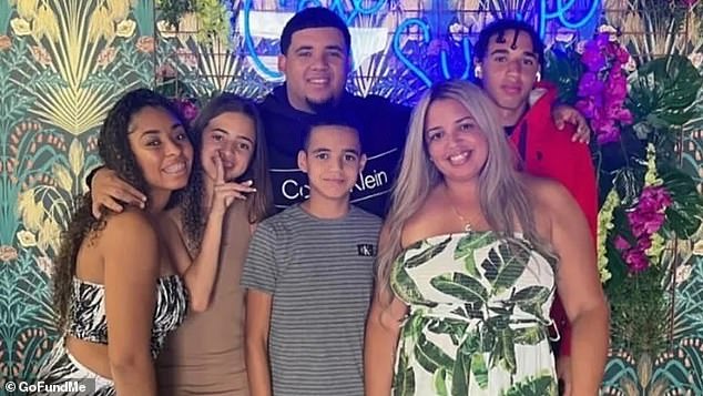 Lazaro Martinez (center), 14, of Princeton — located about 35 miles (56 kilometers) outside Miami — was crossing the street on Southwest 112th Avenue near 232nd Street when a black Audi killed him Tuesday in front of his eight-year-old cousin.