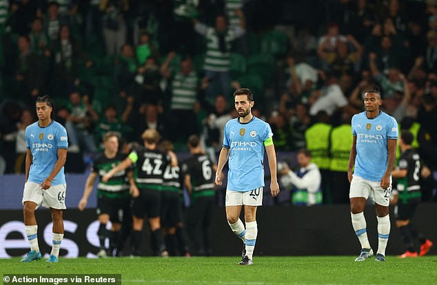 Bernardo Silva (centre) has claimed that Manchester City are currently in a 'dark situation'