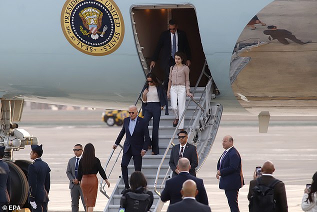 President Joe Biden steps off Air Force One, followed by daughter Ashley Biden and granddaughter Natalie. Biden will spend six days in South America, starting with attending the Asia Pacific Economic Cooperation Forum in Lima, Peru