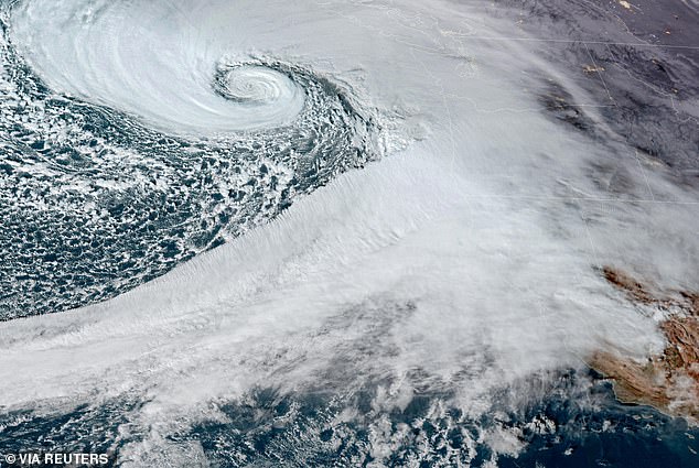 A 'once in a decade' bomb cyclone has unleashed itself on Western states, leaving hundreds of thousands of Americans without power and one dead