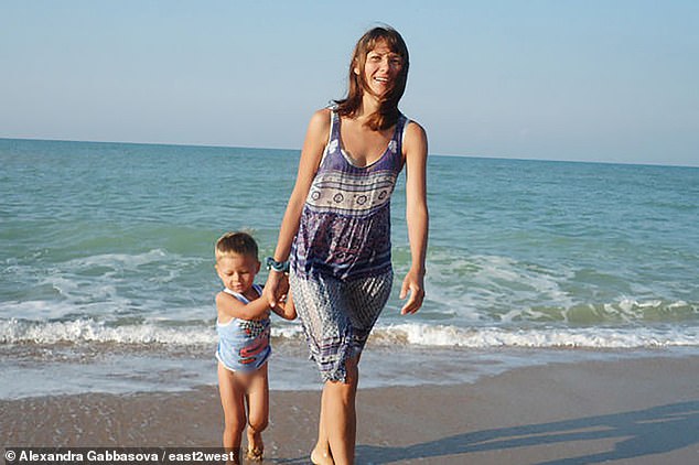 Alexandra Gabbasova, 48, pictured with her son when he was a toddler