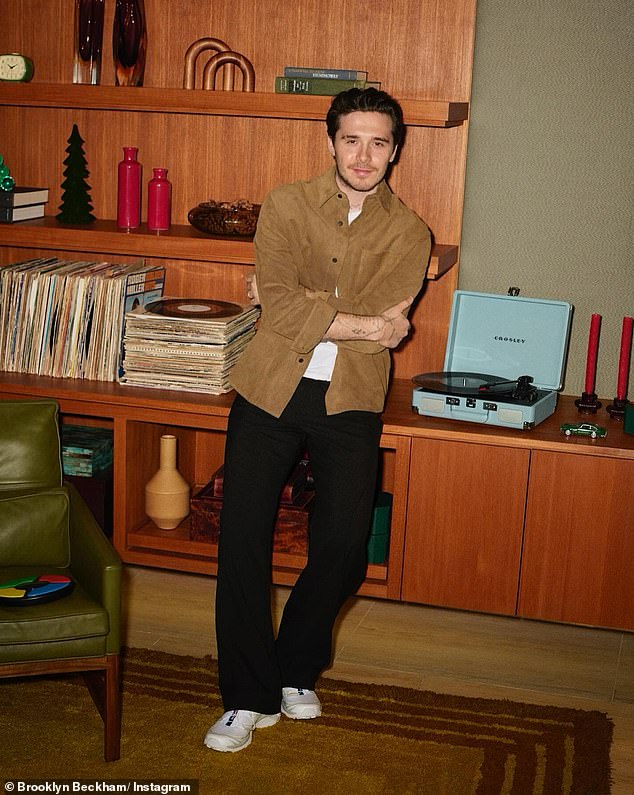 Brooklyn Beckham continued to show off his success as an influencer on Thursday when he modeled for Google on Instagram after admitting 'of course I'm a nepo baby'