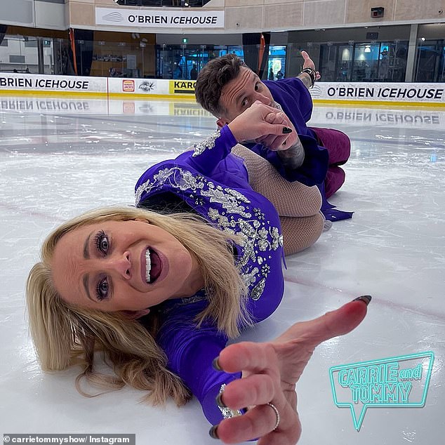 Carrie Bickmore and Tommy Little have fueled romance rumors with their choice of Halloween costumes - dressed as ice skating champions Jayne Torvill and Christopher Dean