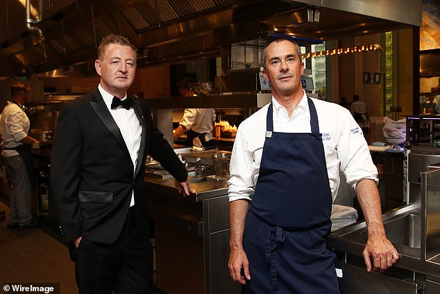 Luke Mangan and chef Nicolas Ciosi pose in the award-winning kitchen of the Glass Brasserie