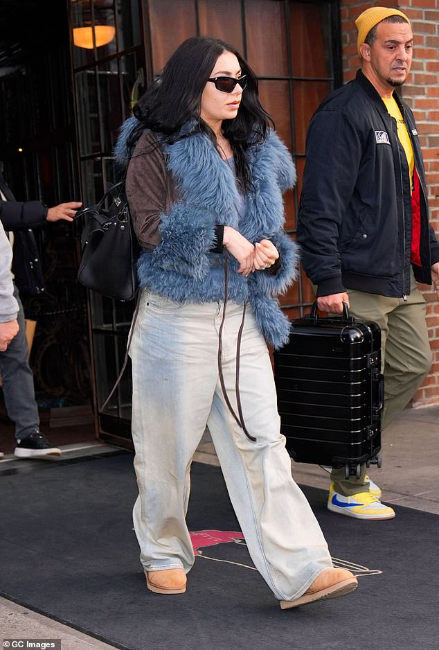 Charli XCX cut a nonchalant figure as she stepped out in New York City on Tuesday, fresh from hosting Saturday Night Live