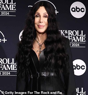 Cher is known for her signature dark locks (seen in October)